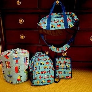 Matching little boys Wildkin book bag, lunch bag, sleeping bag and duffle bag.